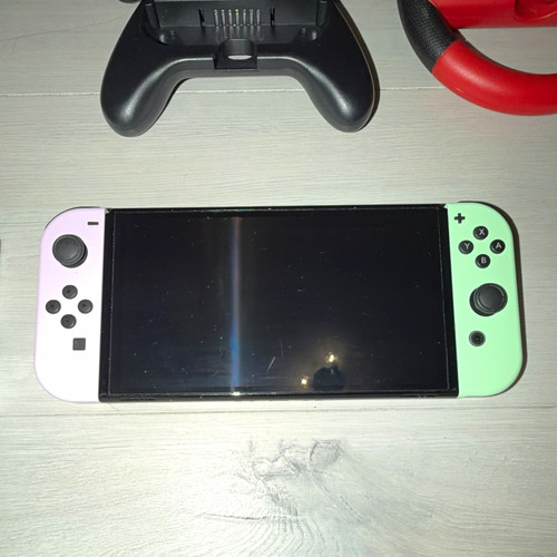 Nintendo switch oled 64gb - nintendo,